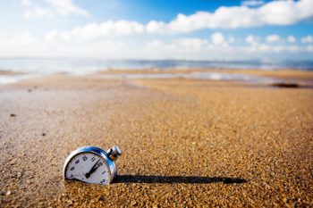 clock-in-sand